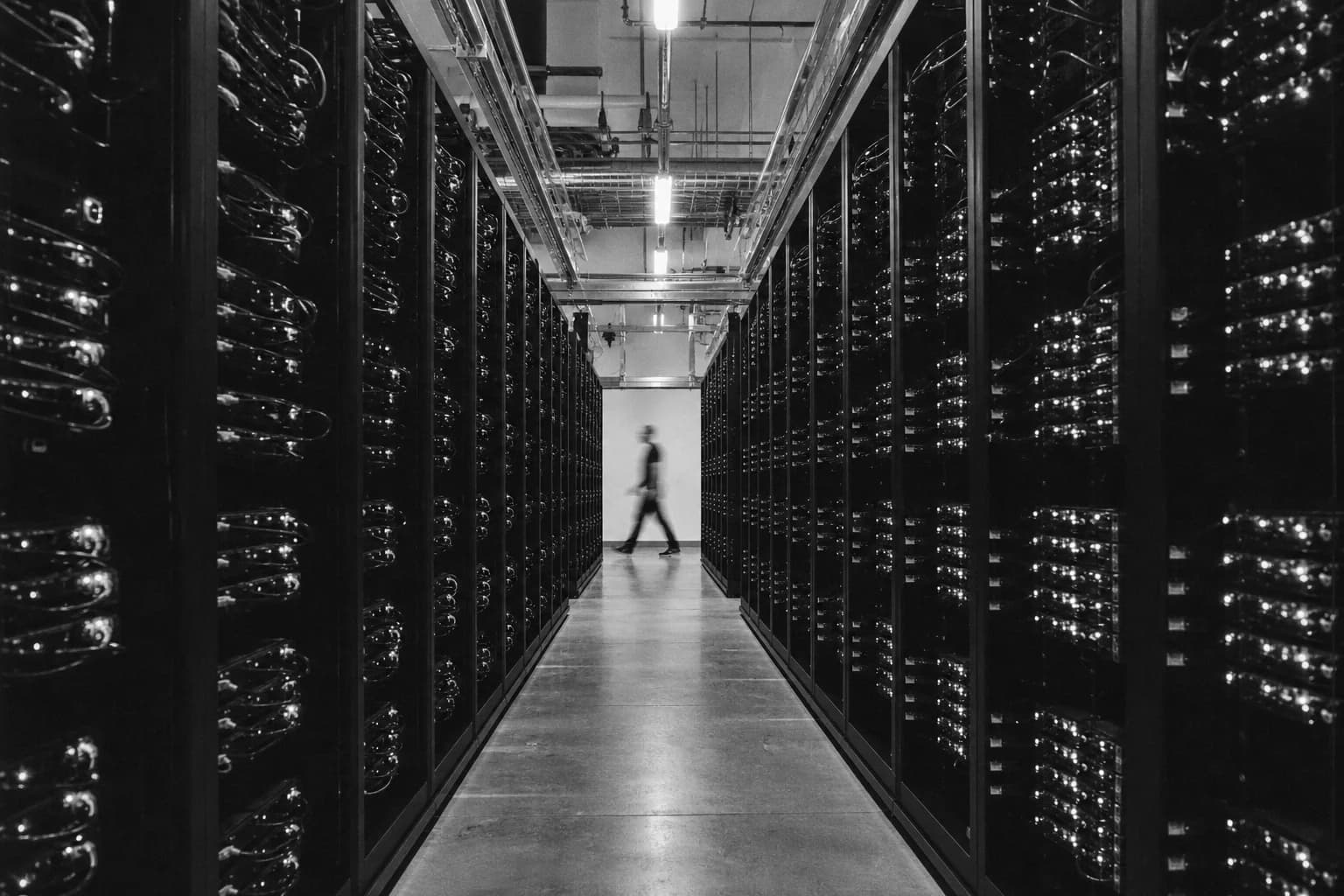 Long aisle between high-density GPU server racks